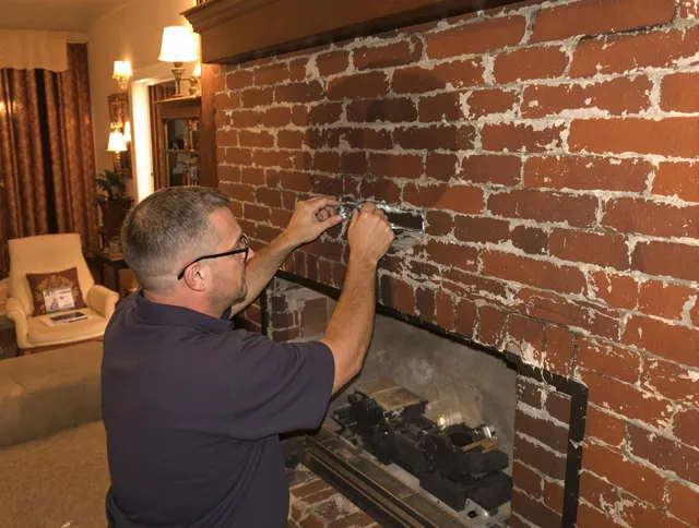 Baldwin Park Chimney Sweep expert fixing a fireplace in Baldwin Park, CA